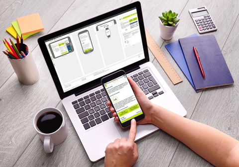 Woman viewing Inspire Flex communications output on mobile device