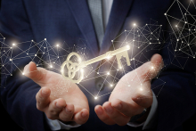 man holding a key that represents unlocking CCM operational excellence