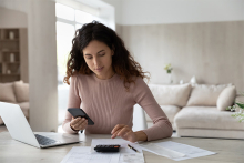 woman adding numbers