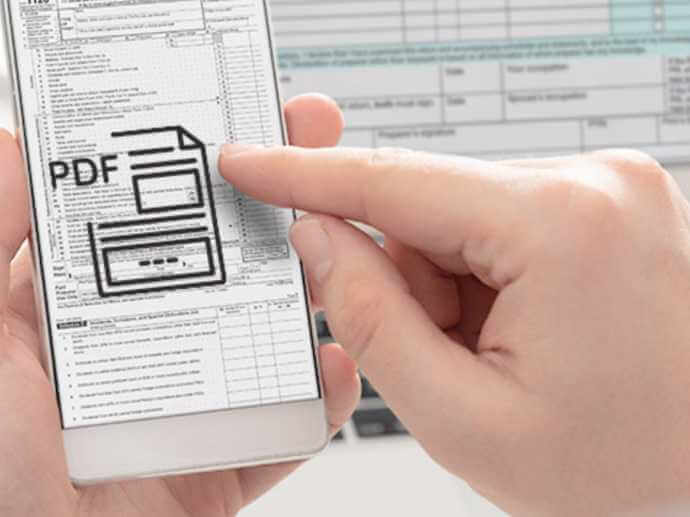 hands scrolling through a PDF document hands scrolling through a PDF document