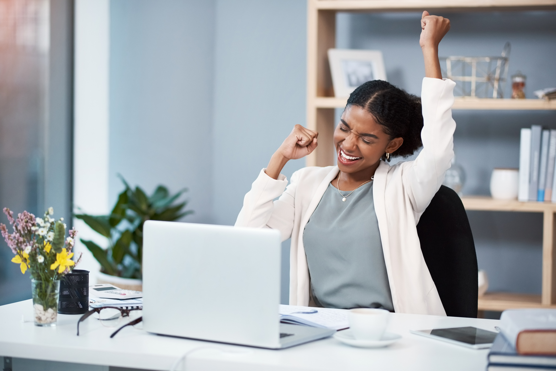 woman celebrates woman celebrates