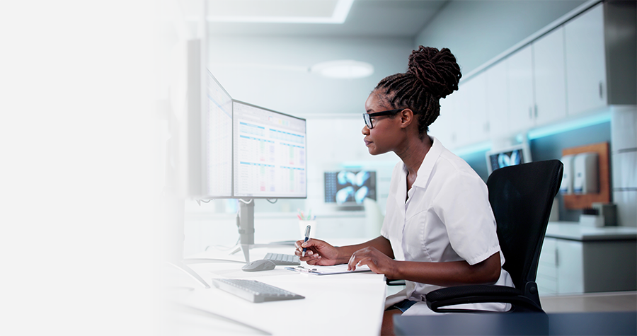 medical worker at her desk