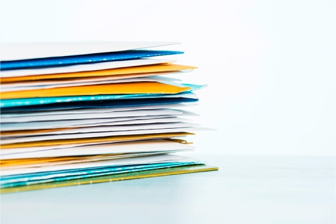 pile of documents in colorful files