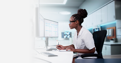 medical worker at her desk